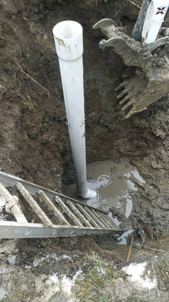 Outside cleanout install in sewer dig up